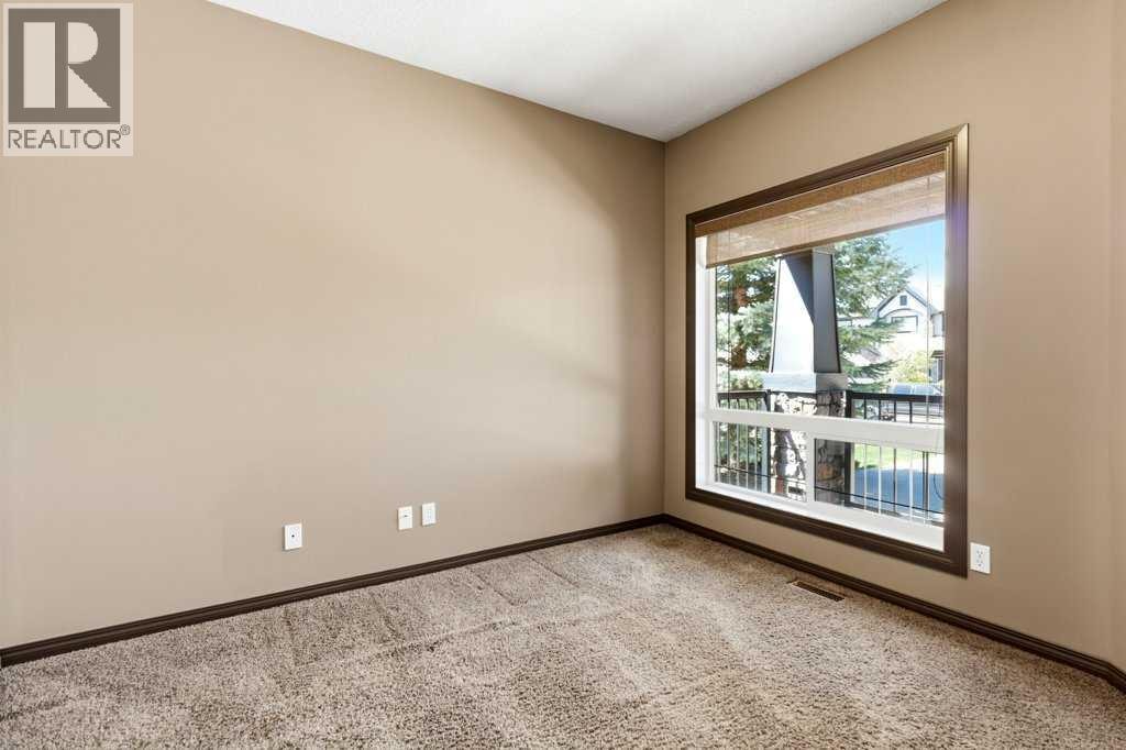 23 Aspen Stone Crescent SW — photo 3