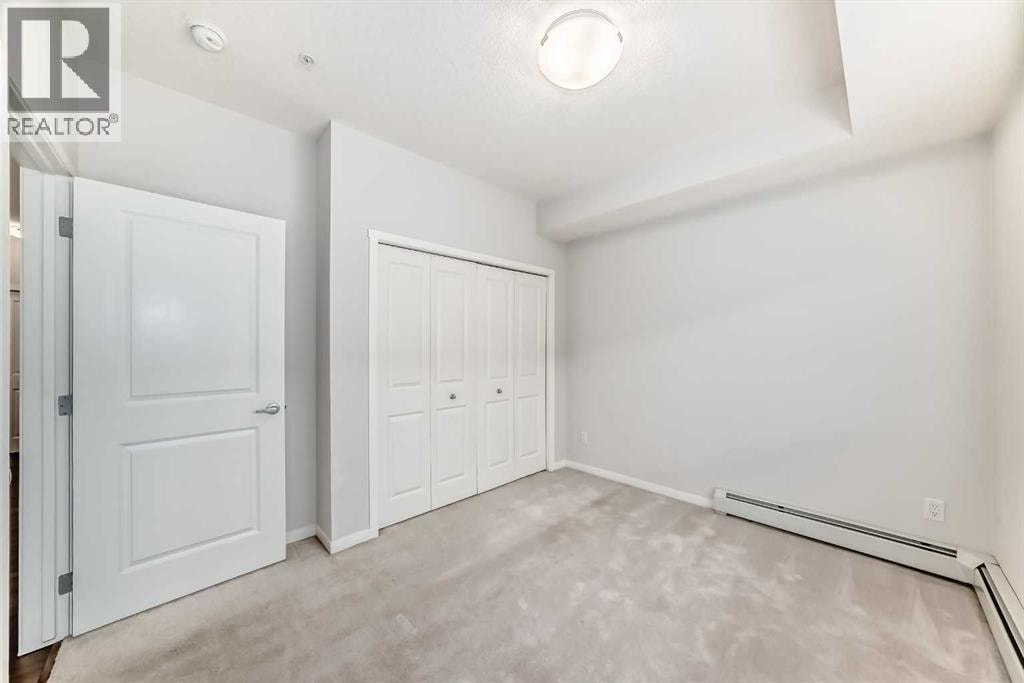 104, 360 Harvest Hills Common NE — photo 24