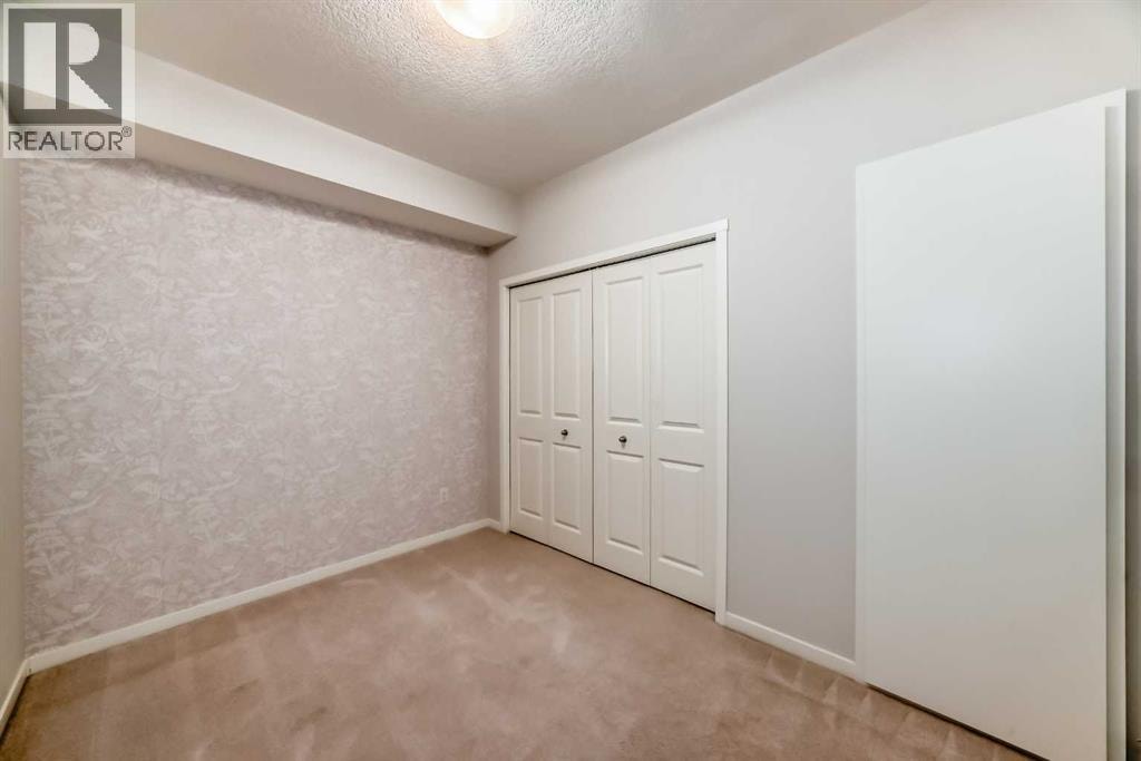 104, 360 Harvest Hills Common NE — photo 27