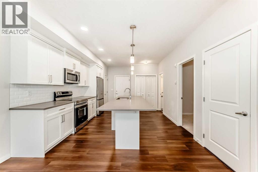 104, 360 Harvest Hills Common NE — photo 6