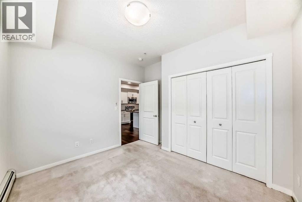 104, 360 Harvest Hills Common NE — photo 23