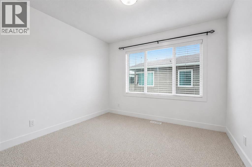 310, 669 Savanna Boulevard NE — photo 21