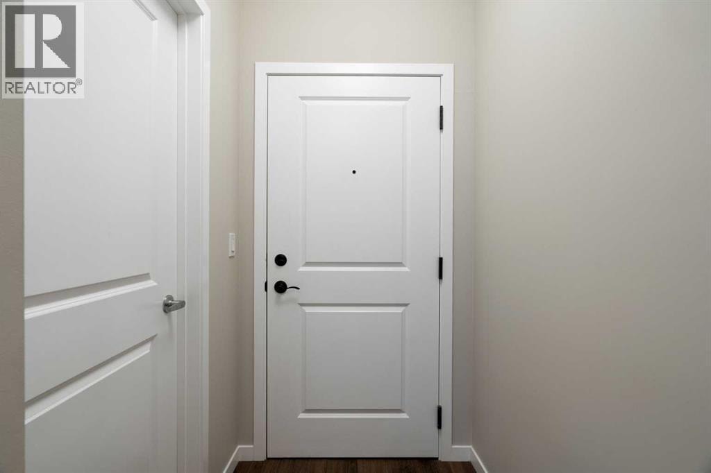 112, 30 Mahogany Mews SE — photo 3
