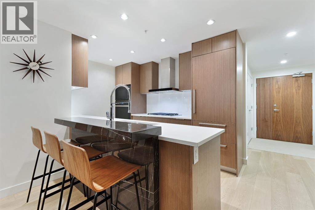 104, 128 Waterfront Court SW — photo 3