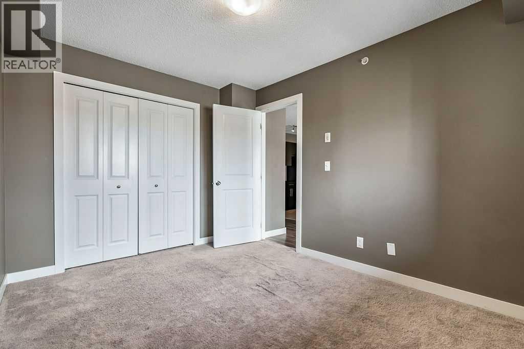 9410, 403 Mackenzie Way SW — photo 15