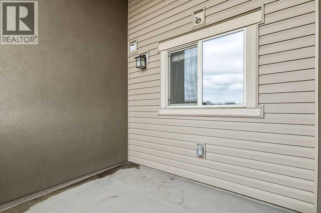 9410, 403 Mackenzie Way SW — photo 21