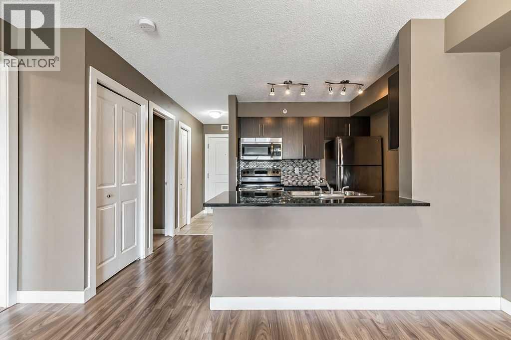 9410, 403 Mackenzie Way SW — photo 10