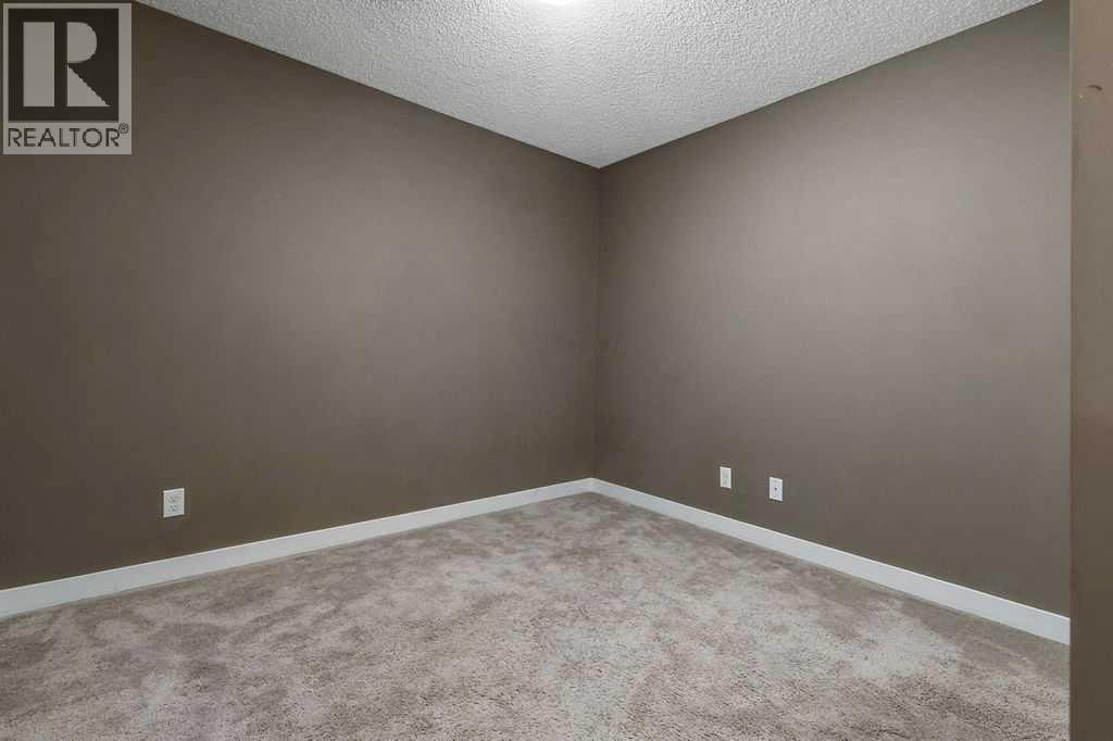 9410, 403 Mackenzie Way SW — photo 16