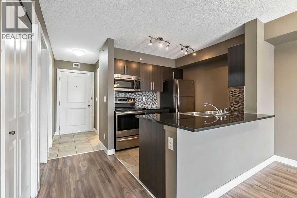 9410, 403 Mackenzie Way SW — photo 9
