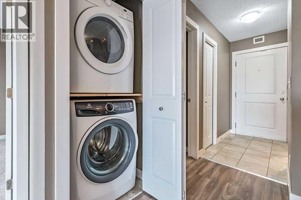 9410, 403 Mackenzie Way SW — photo 19