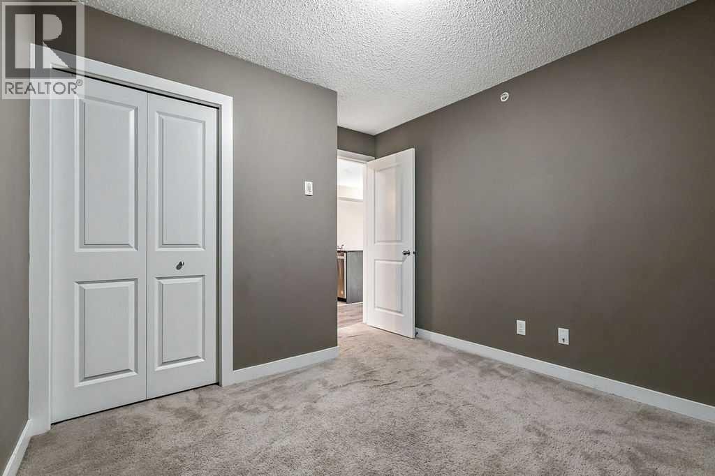 9410, 403 Mackenzie Way SW — photo 17