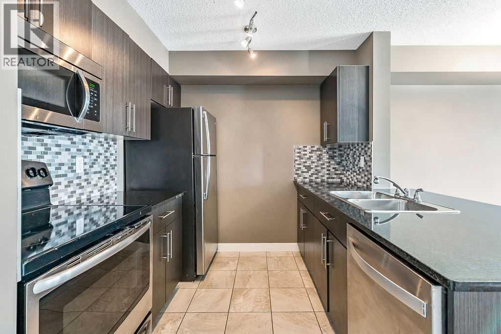 9410, 403 Mackenzie Way SW — photo 8