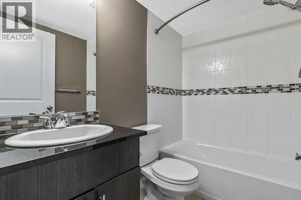 9410, 403 Mackenzie Way SW — photo 18