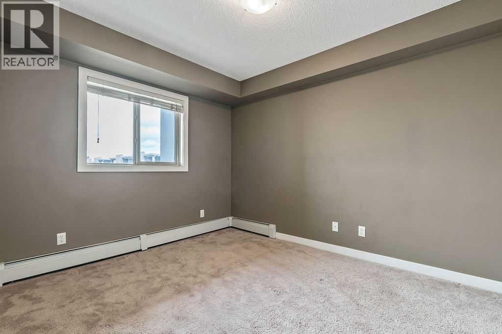 9410, 403 Mackenzie Way SW — photo 14