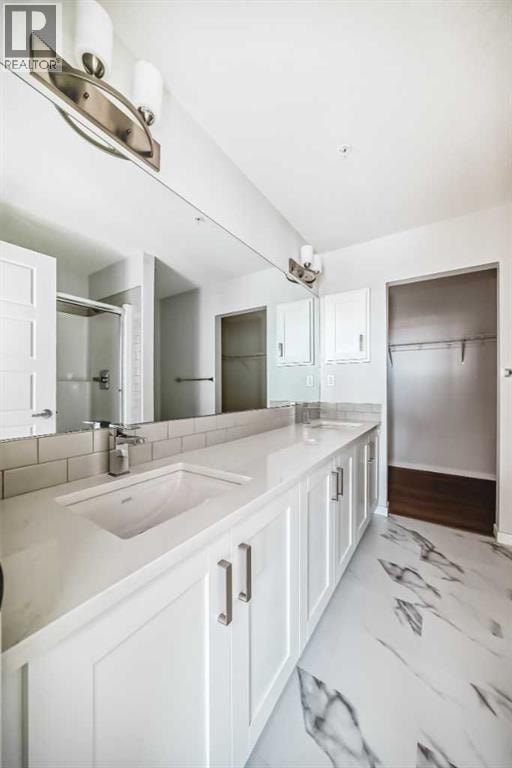 1305, 42 Cranbrook Gardens SE — photo 27
