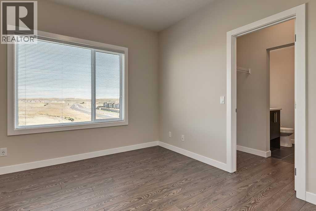 201, 4 Sage Hill Terrace NW — photo 9