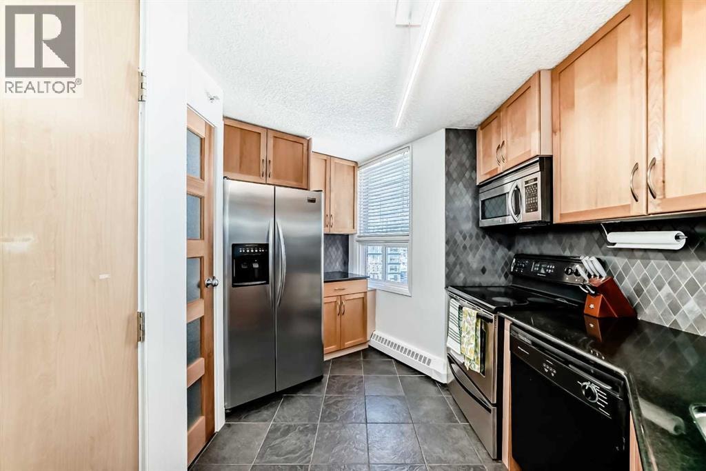 703, 626 15 Avenue SW — photo 5