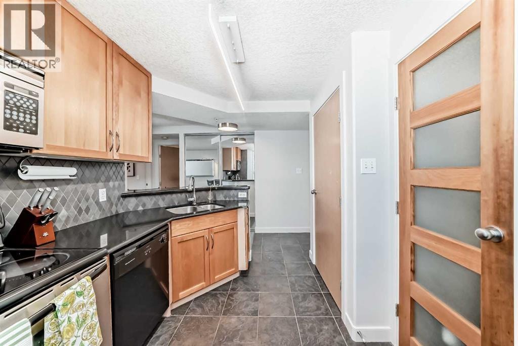 703, 626 15 Avenue SW — photo 7