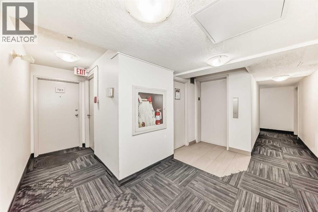 703, 626 15 Avenue SW — photo 31