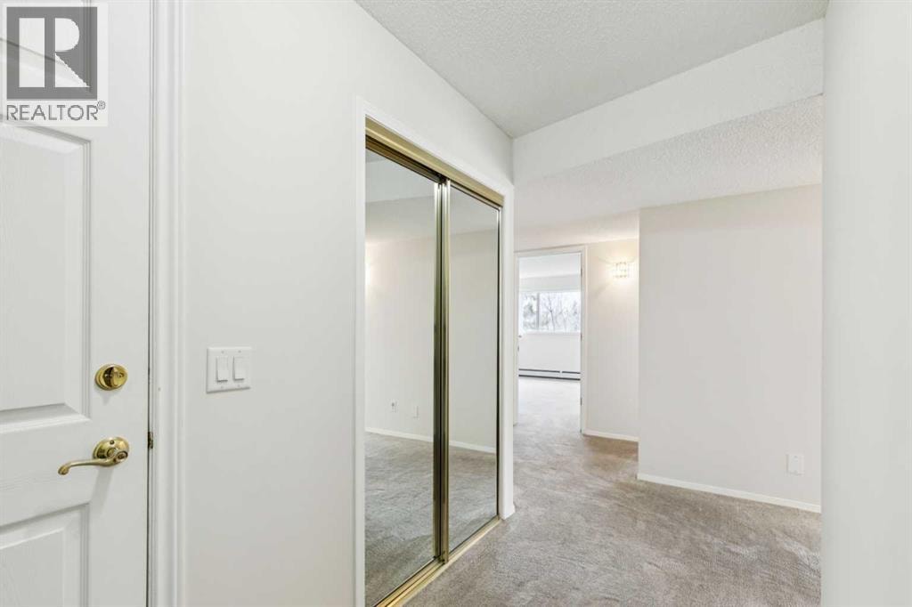 2309, 2309 Hawksbrow Point NW — photo 4