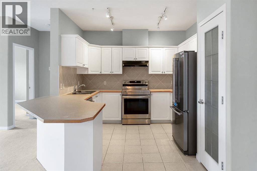 1311, 1311 Lake Fraser Green SE — photo 6