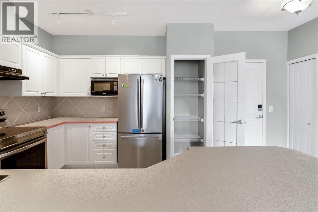 1311, 1311 Lake Fraser Green SE — photo 9