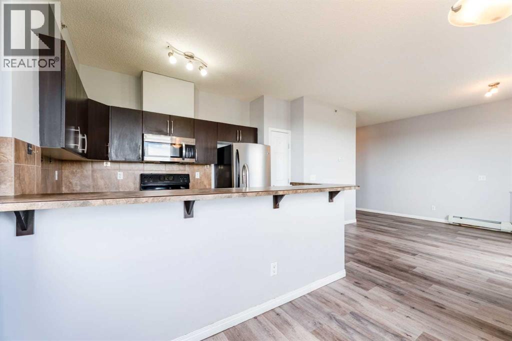 425, 1727 54 Street SE — photo 3