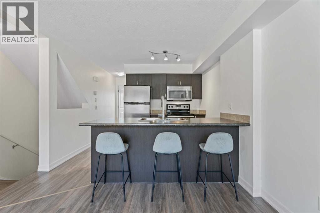 410, 121 Copperpond Common SE — photo 13
