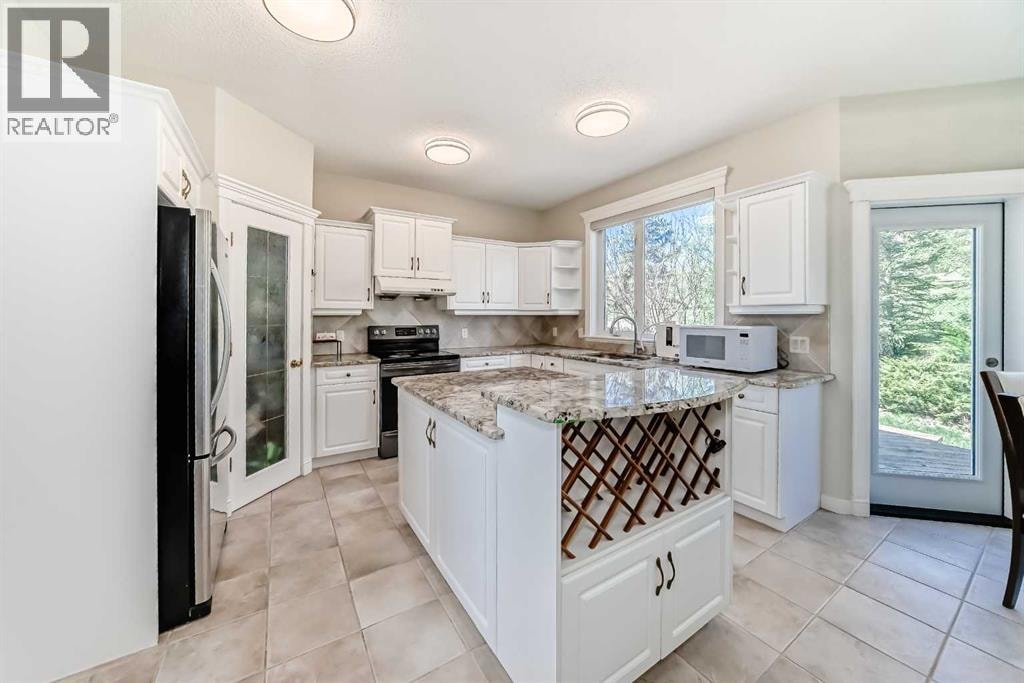 130 PANORAMA HILLS View NW — photo 8