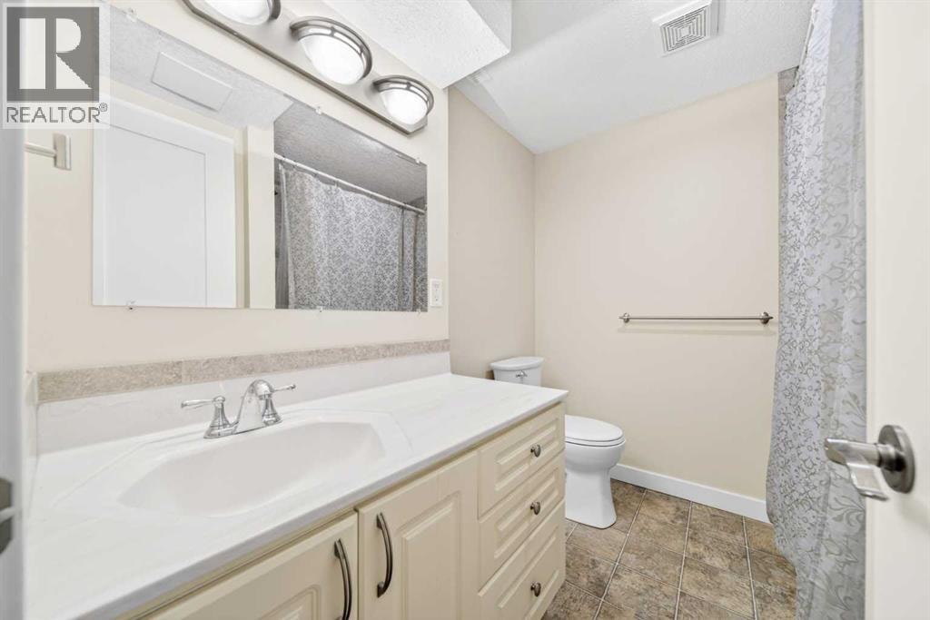 1728 Lake Bonavista Drive SE — photo 39