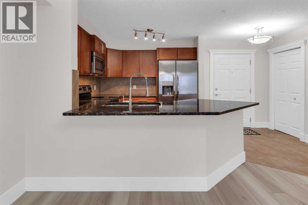 102, 500 Rocky Vista Gardens NW — photo 8