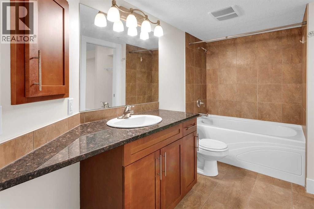 102, 500 Rocky Vista Gardens NW — photo 20
