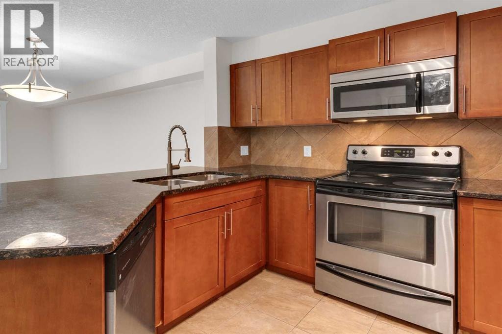 102, 500 Rocky Vista Gardens NW — photo 5