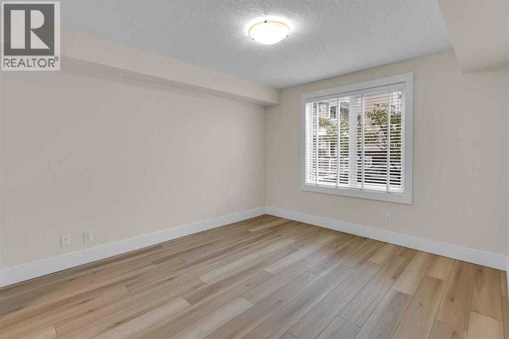 102, 500 Rocky Vista Gardens NW — photo 17