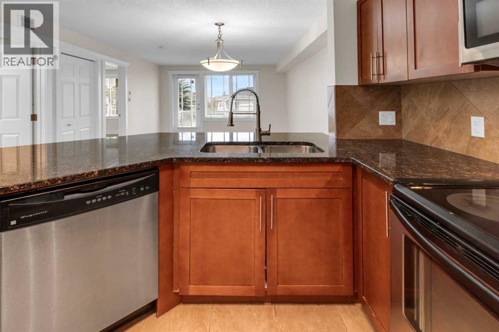 102, 500 Rocky Vista Gardens NW — photo 6