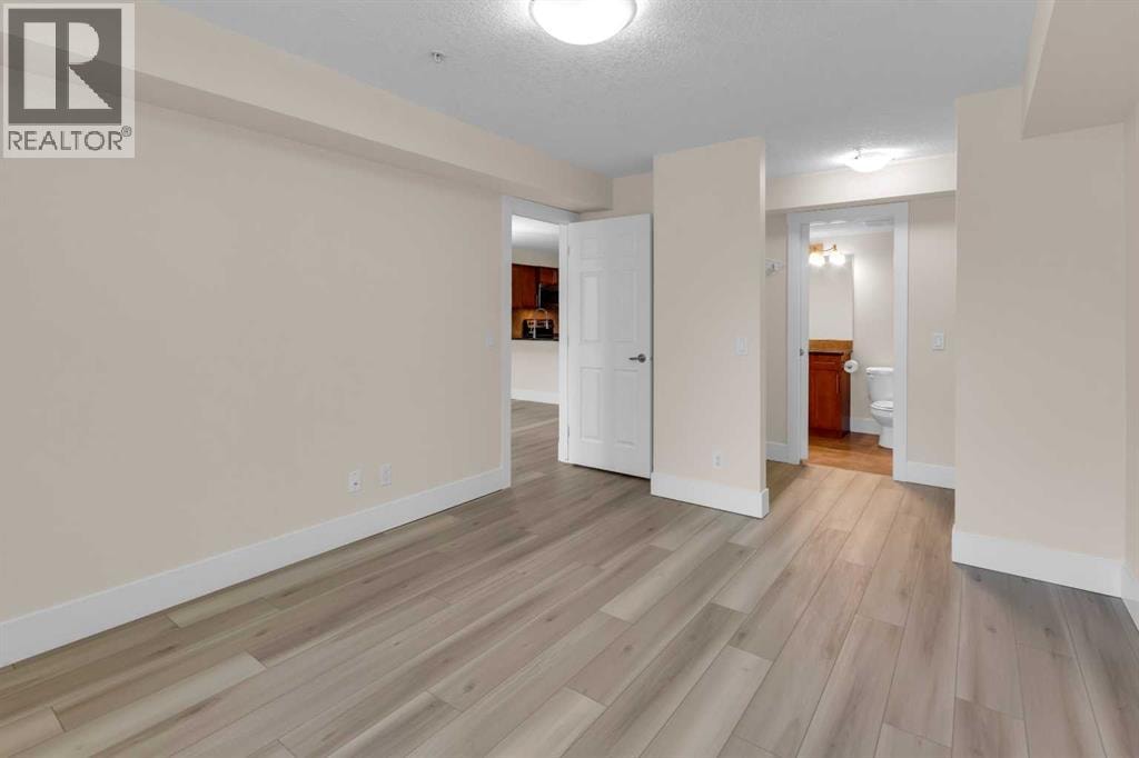 102, 500 Rocky Vista Gardens NW — photo 18
