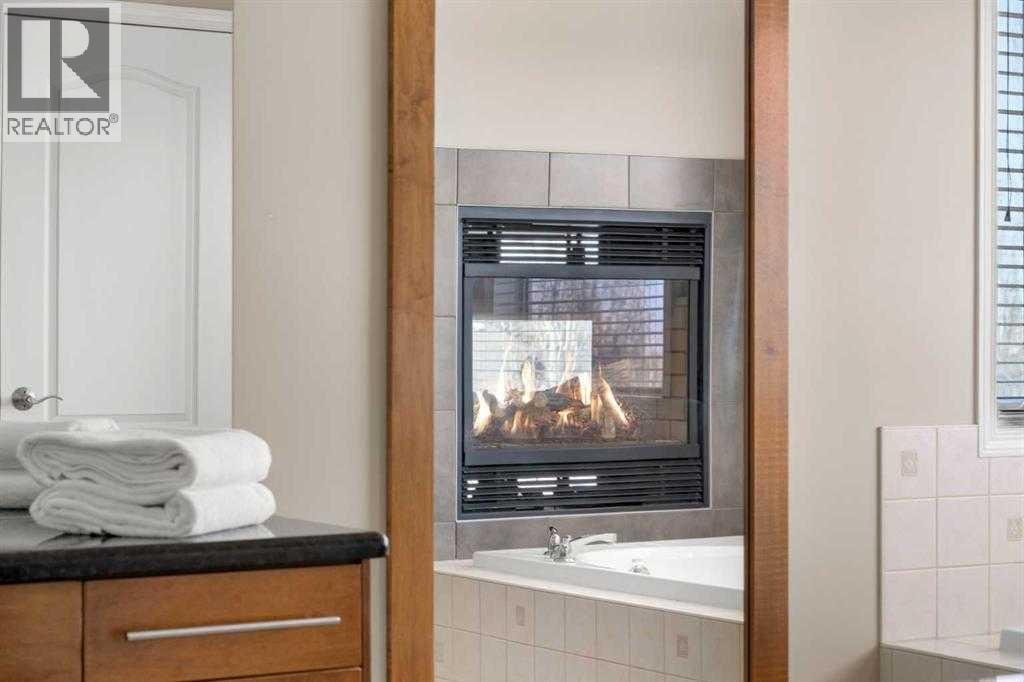 32 Evercreek Bluffs Crescent SW — photo 8