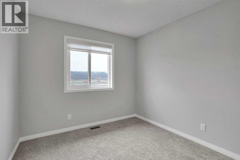 667 Wolf Willow Boulevard SE — photo 36
