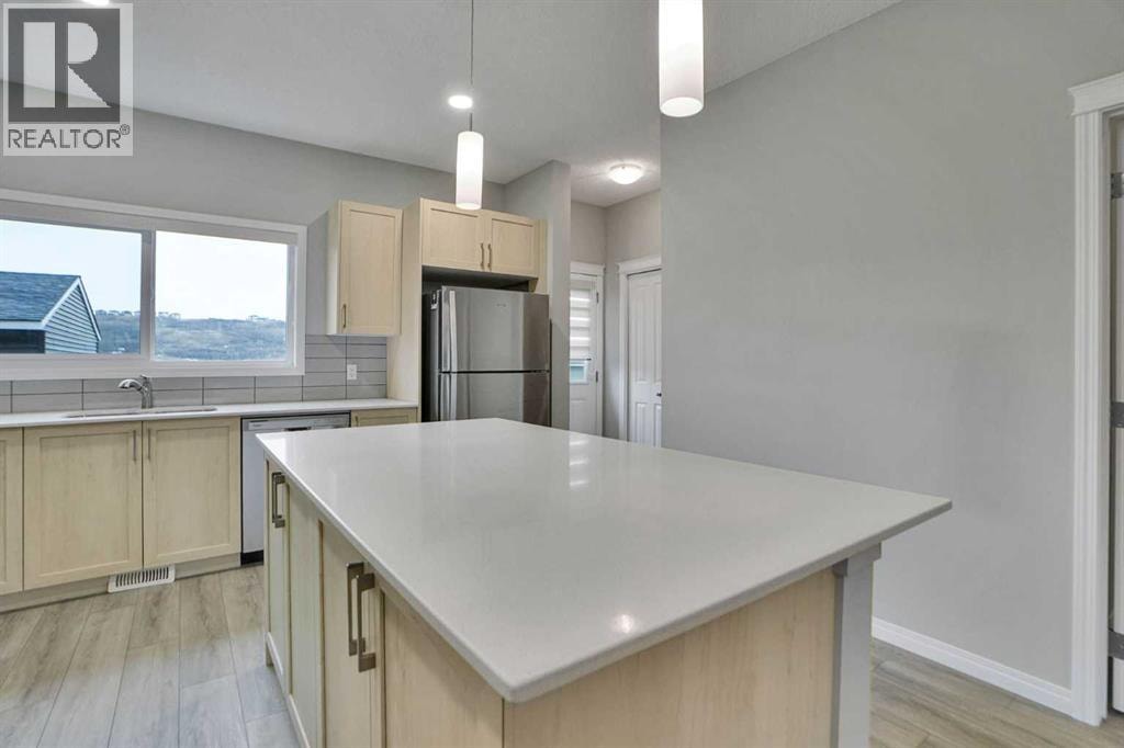 667 Wolf Willow Boulevard SE — photo 21