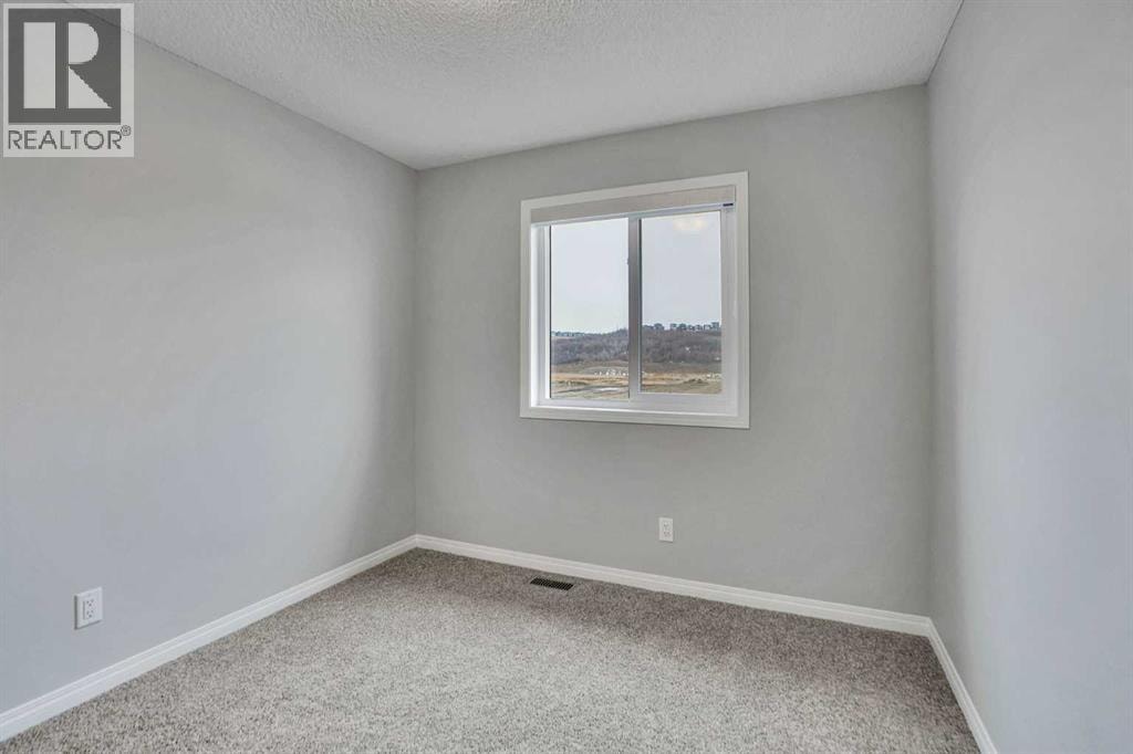 667 Wolf Willow Boulevard SE — photo 30