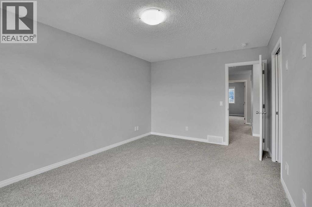 667 Wolf Willow Boulevard SE — photo 40