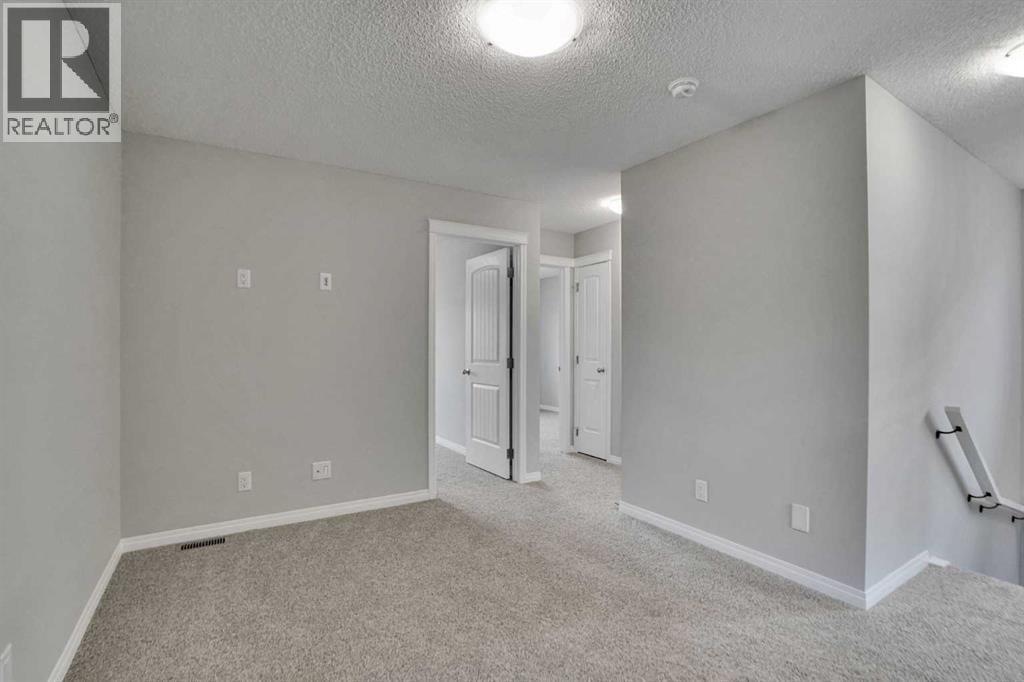 667 Wolf Willow Boulevard SE — photo 25