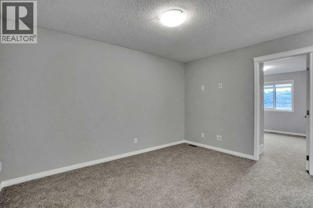 667 Wolf Willow Boulevard SE — photo 24