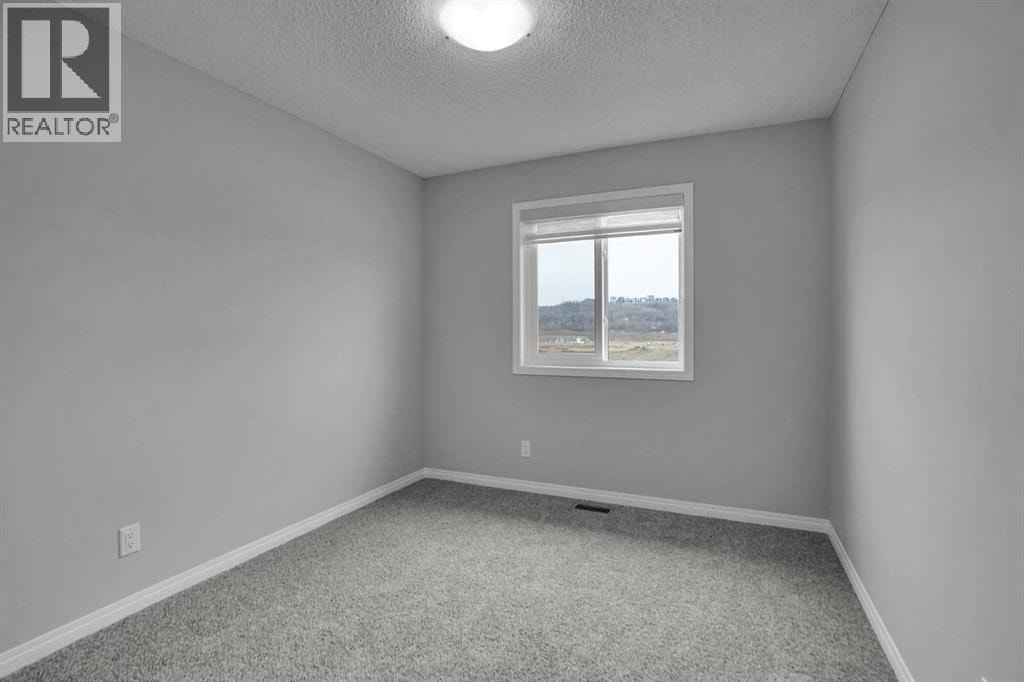 667 Wolf Willow Boulevard SE — photo 33