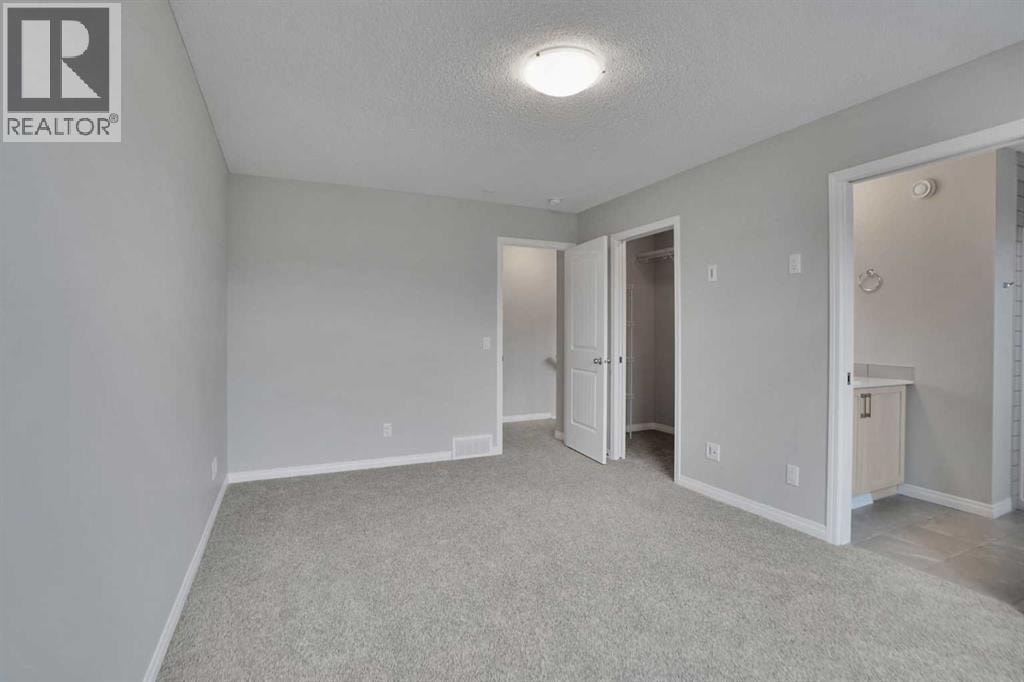 667 Wolf Willow Boulevard SE — photo 39