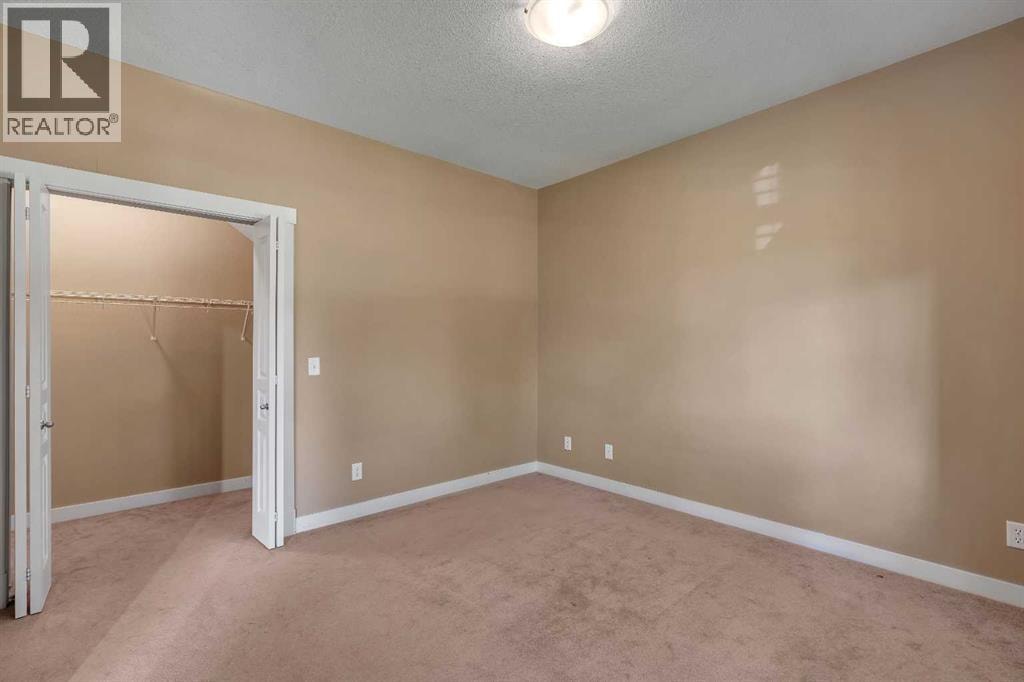 1306, 281 Cougar Ridge Drive SW — photo 19