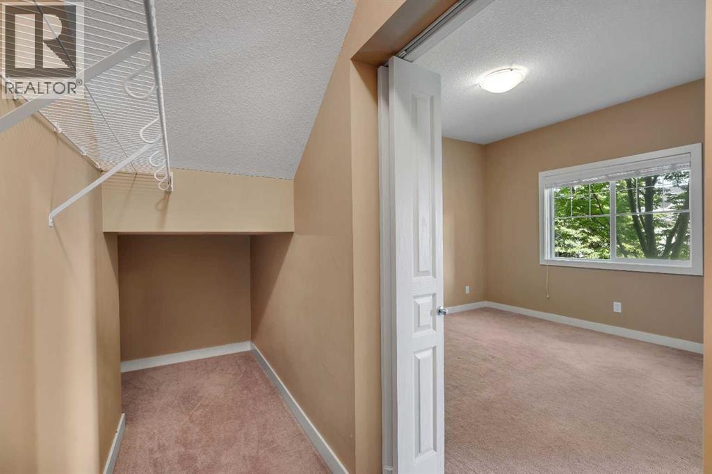 1306, 281 Cougar Ridge Drive SW — photo 23
