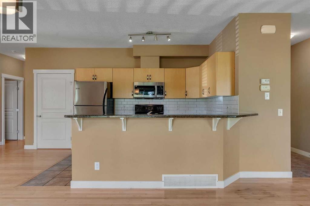 1306, 281 Cougar Ridge Drive SW — photo 9