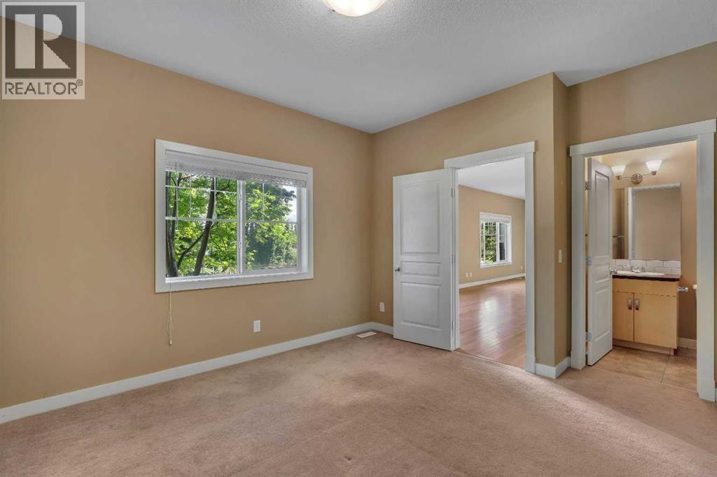 1306, 281 Cougar Ridge Drive SW — photo 18