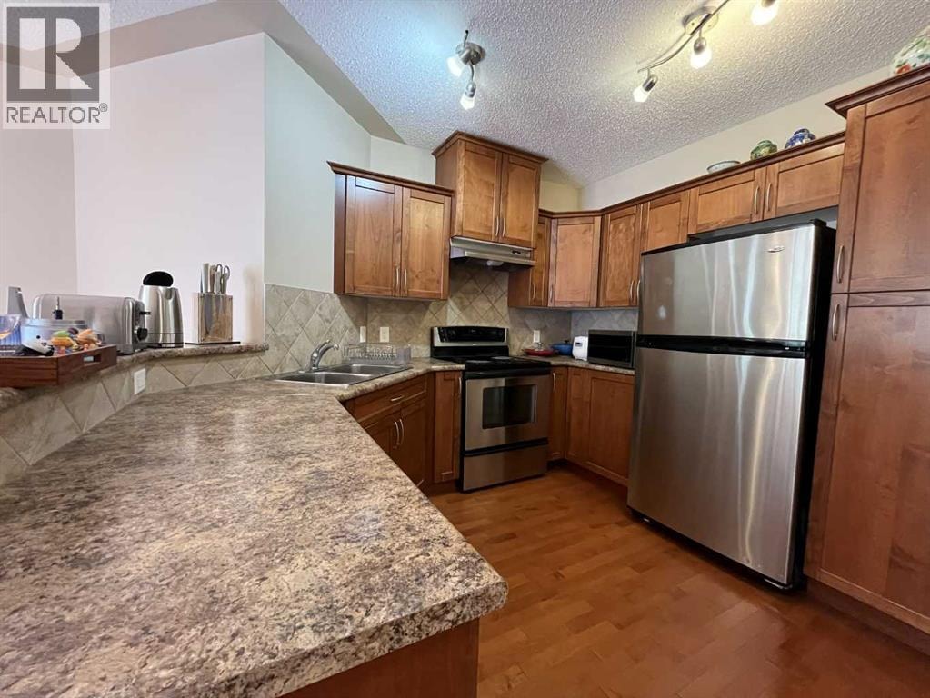 305, 30 Discovery Ridge Close SW — photo 4